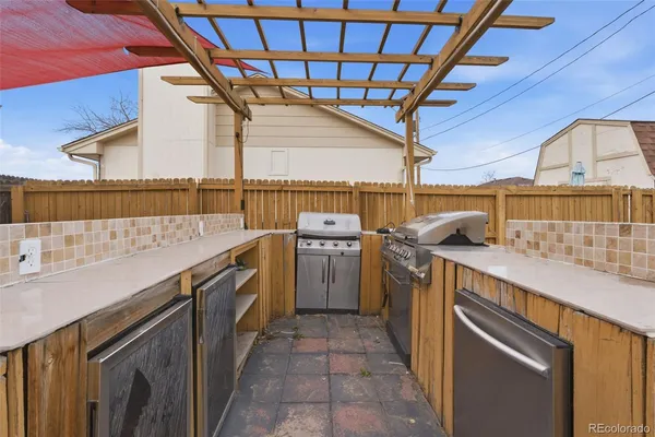 a utility room with a sink a washer and dryer