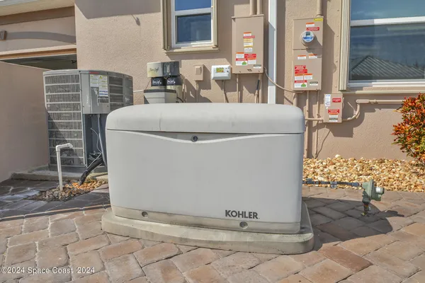 a room with water heater and a window