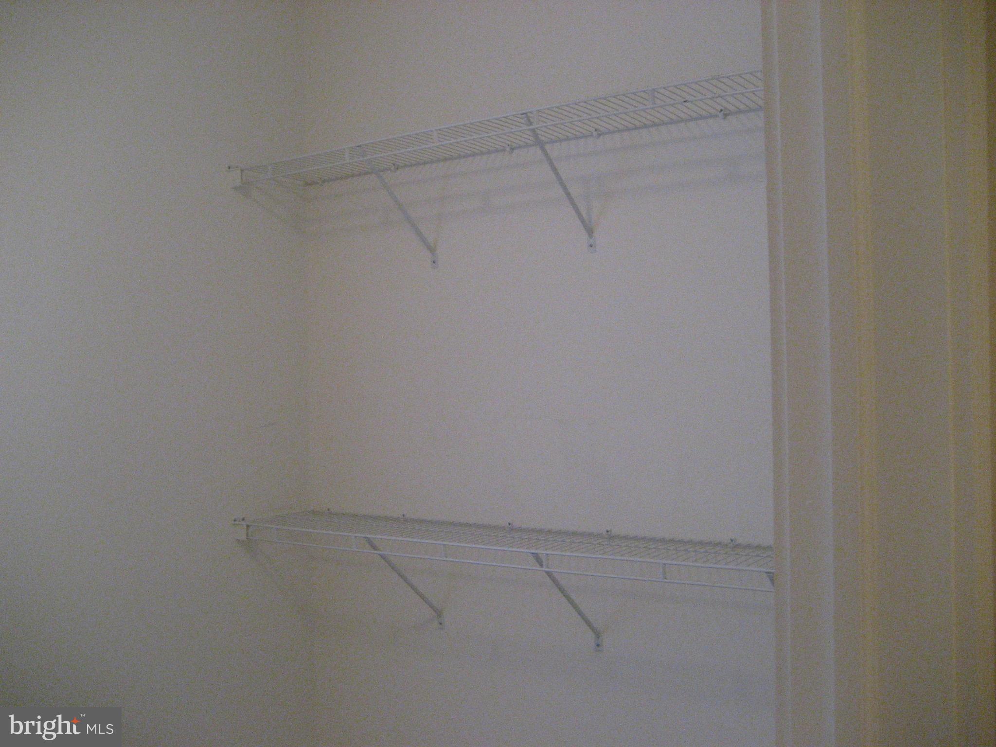 180 Carriage Chase Circle Warrenton, VA 20186 - Photo 13 of 22 a view of a room with racks on the wall