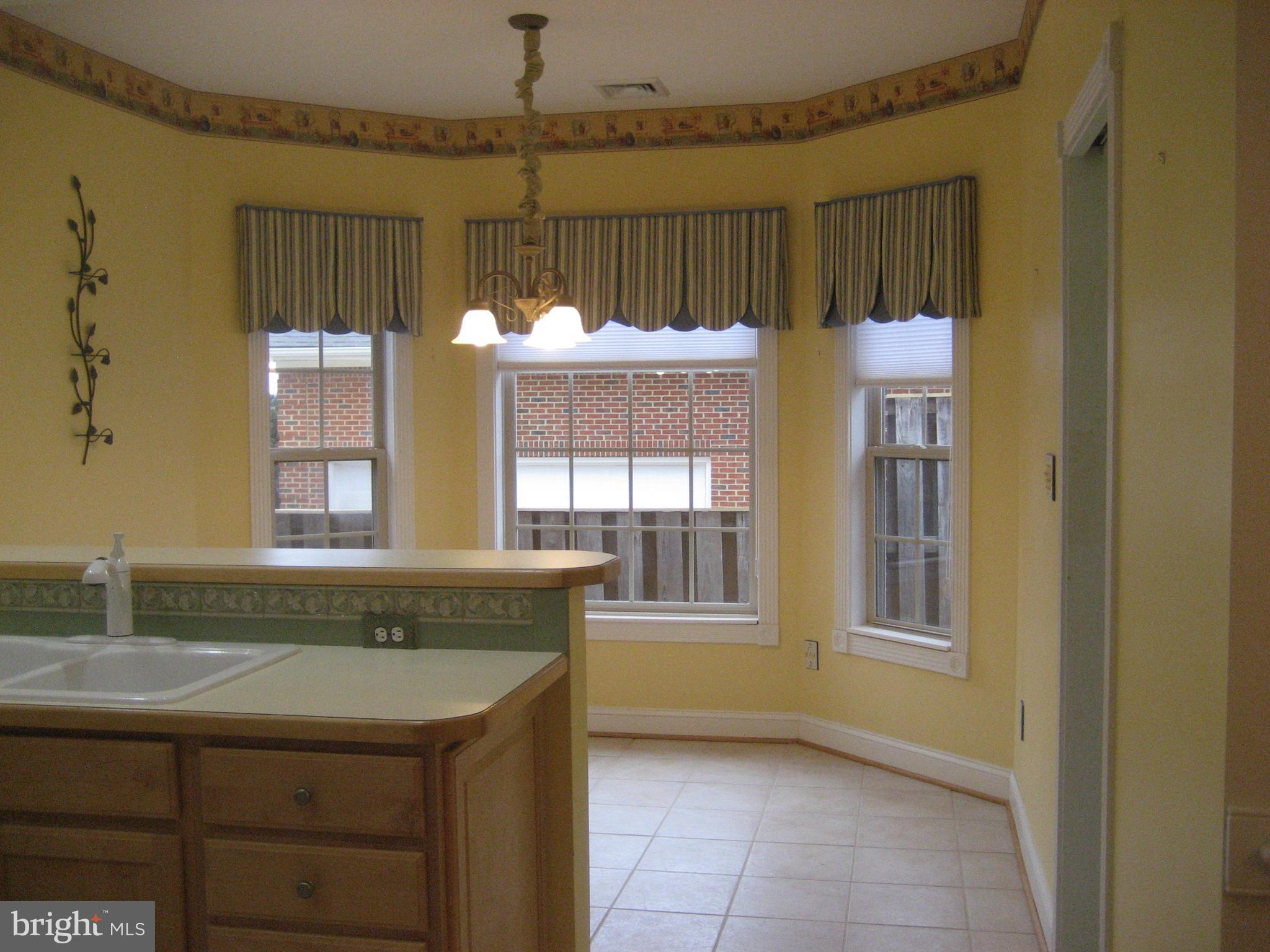 180 Carriage Chase Circle Warrenton, VA 20186 - Photo 15 of 22 a bathroom with a sink and a mirror