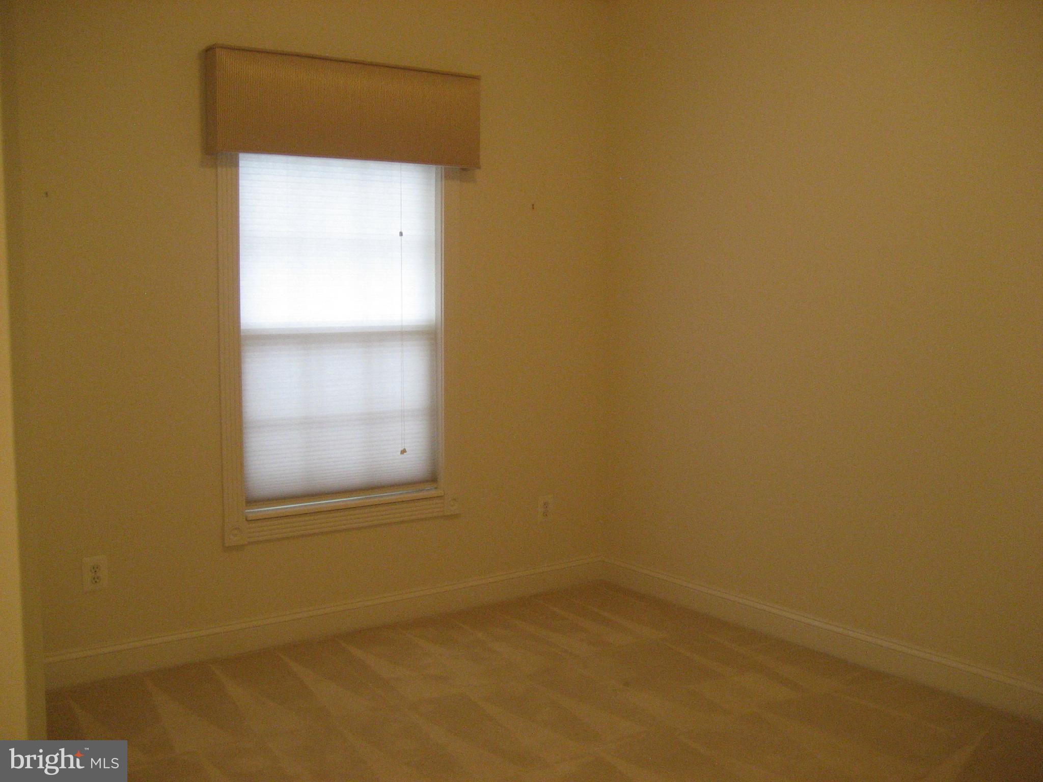 180 Carriage Chase Circle Warrenton, VA 20186 - Photo 18 of 22 a view of an empty room with a window