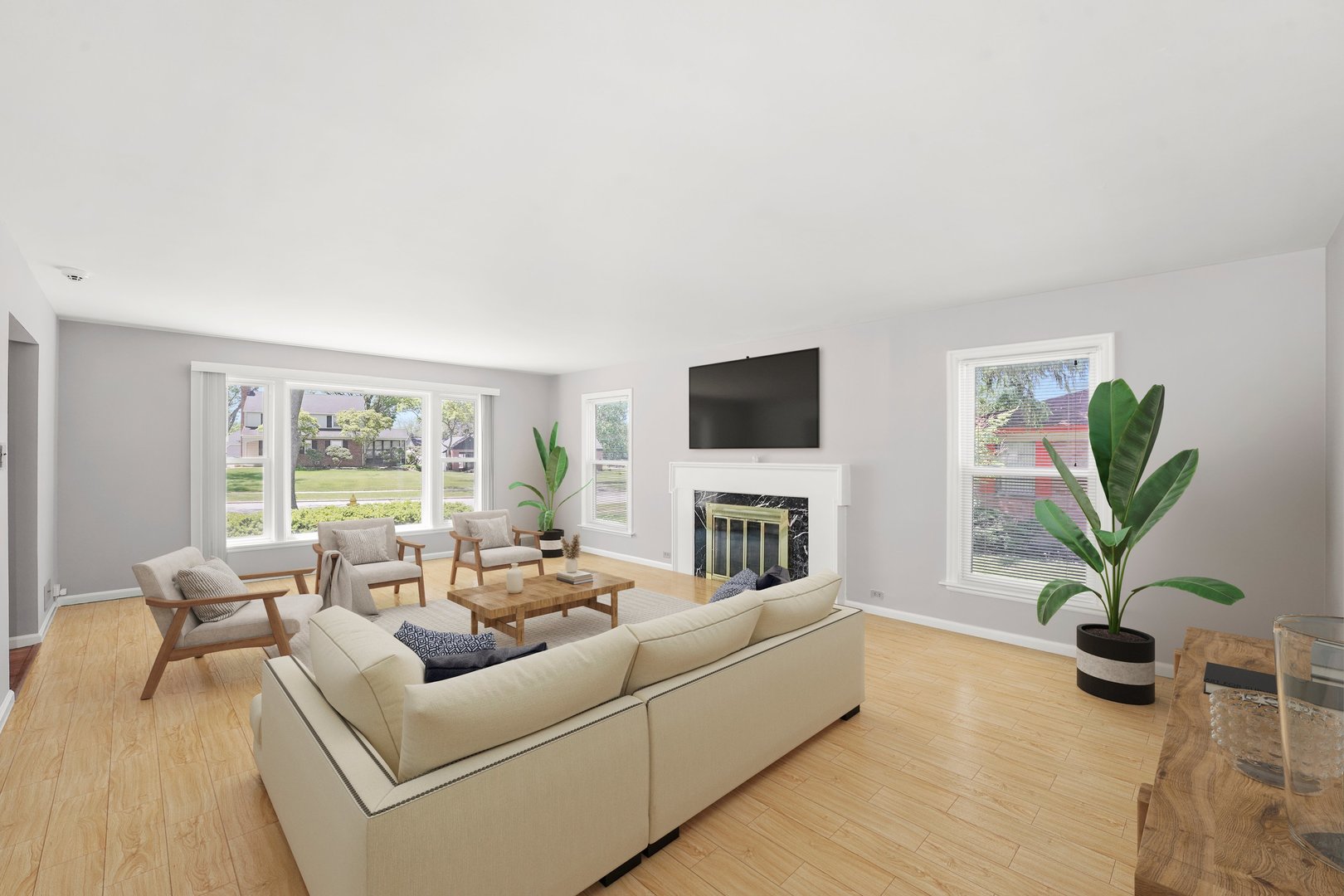 255 Irving Boulevard Chicago Heights, IL 60411 - Photo 2 of 42 a living room with furniture a large window and a flat screen tv