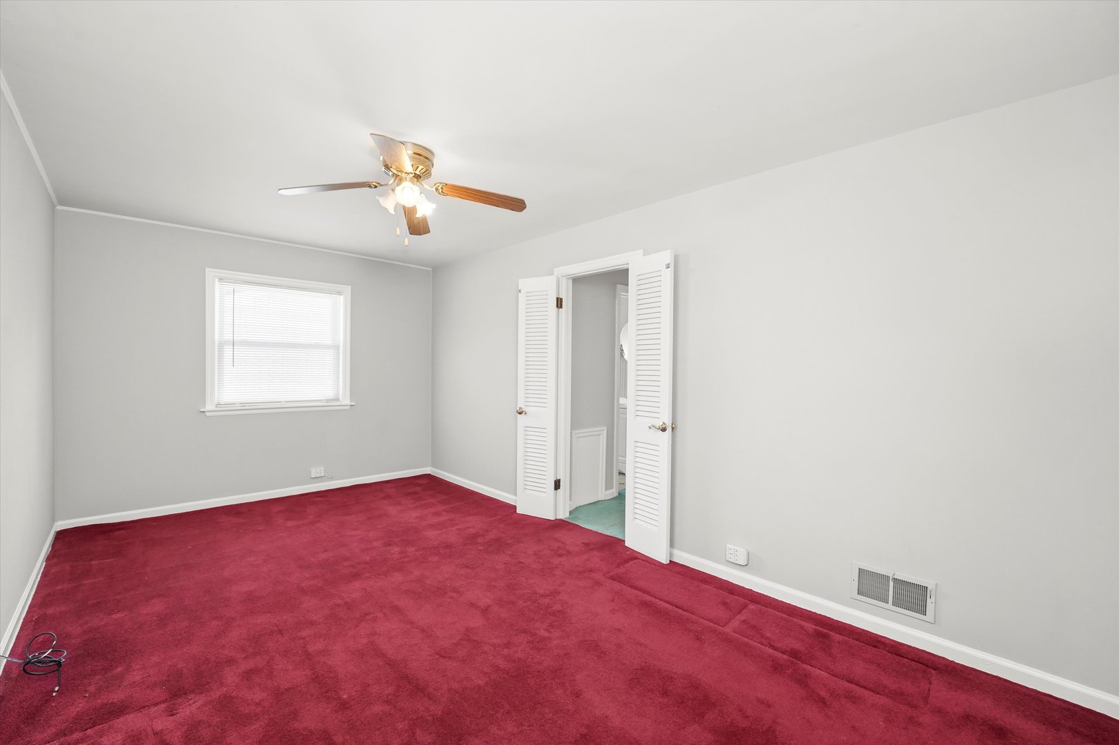 255 Irving Boulevard Chicago Heights, IL 60411 - Photo 22 of 42 a view of a big room with carpet