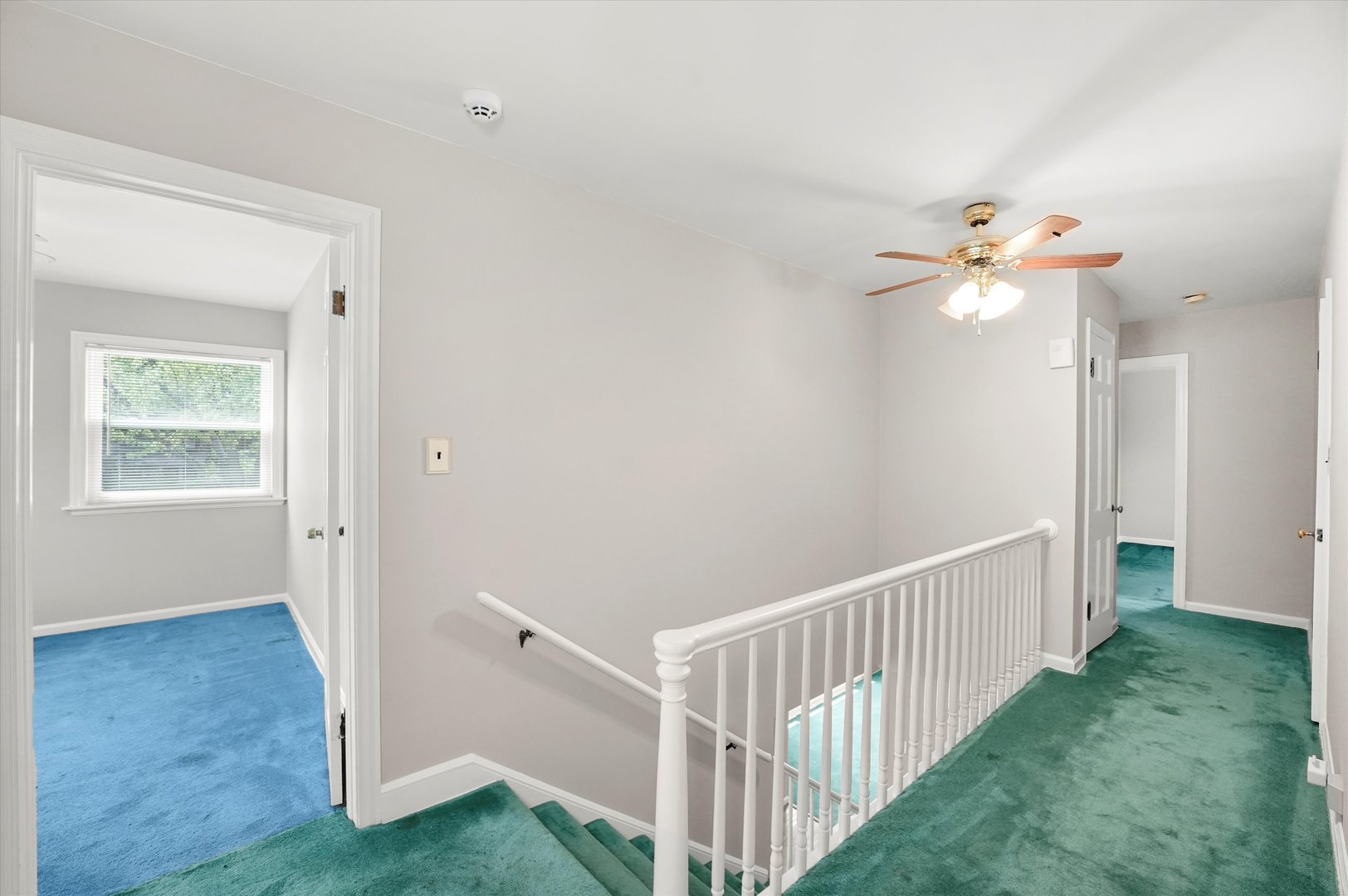 255 Irving Boulevard Chicago Heights, IL 60411 - Photo 28 of 42 a view of a hallway with a chandelier fan