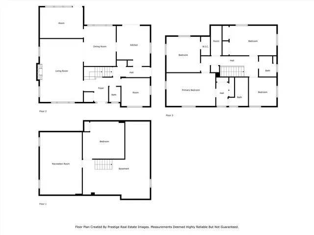 a picture of a room with a white wall and a refrigerator