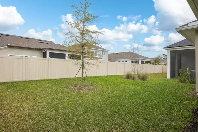 a view of a room with a yard