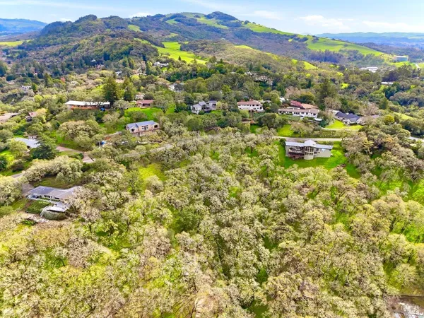 a view of a city with mountains in the background