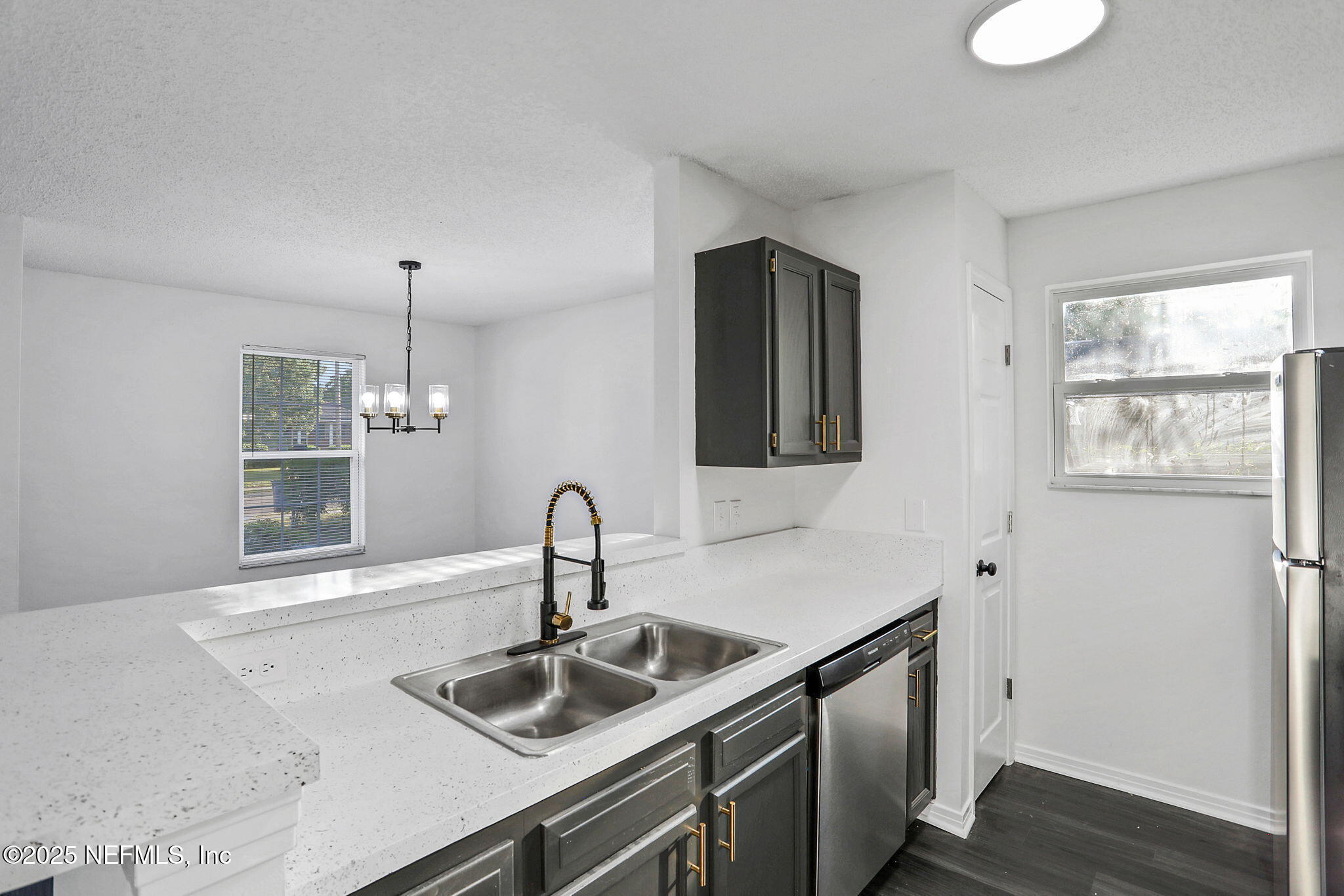 2122 Brooklyn Road Jacksonville, FL 32209 - Photo 6 of 19 a kitchen with a sink cabinets and wooden floor