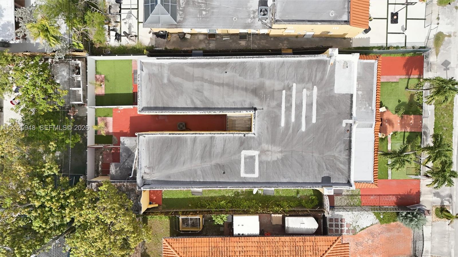 1745 Southwest 17th Street, Unit 2 Miami, FL 33145 - Photo 5 of 32 an aerial view of a house with a garden