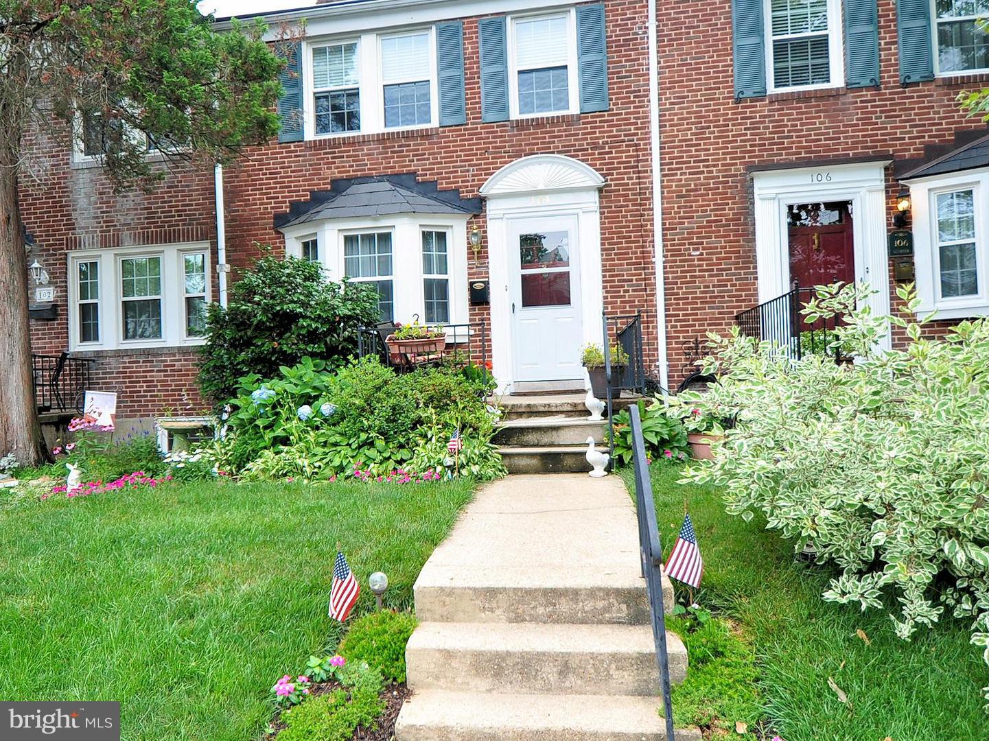 104 Overbrook Road Baltimore, MD 21212 - Photo 1 of 27 a front view of a house with garden