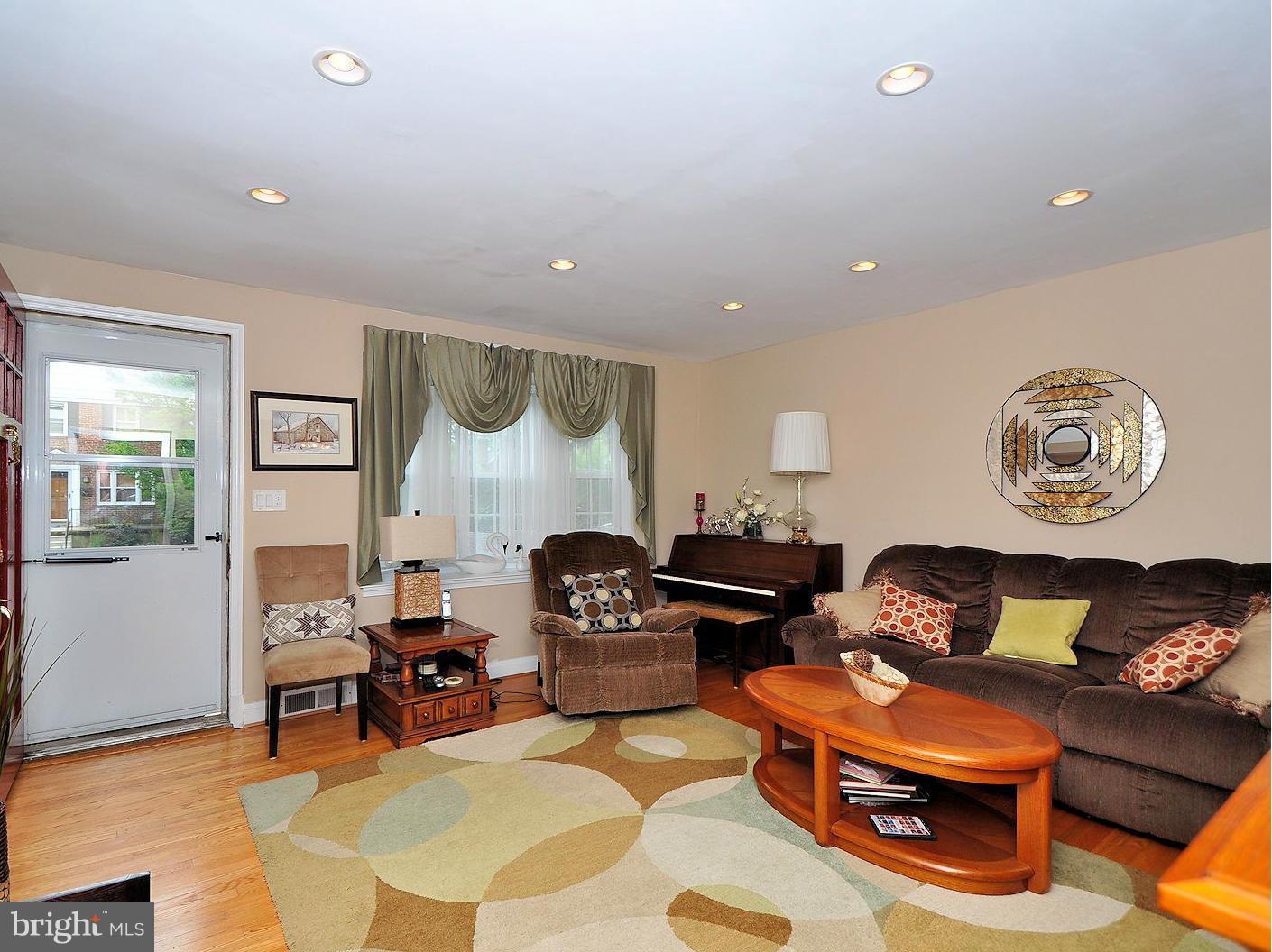 104 Overbrook Road Baltimore, MD 21212 - Photo 3 of 27 a living room with furniture and a table