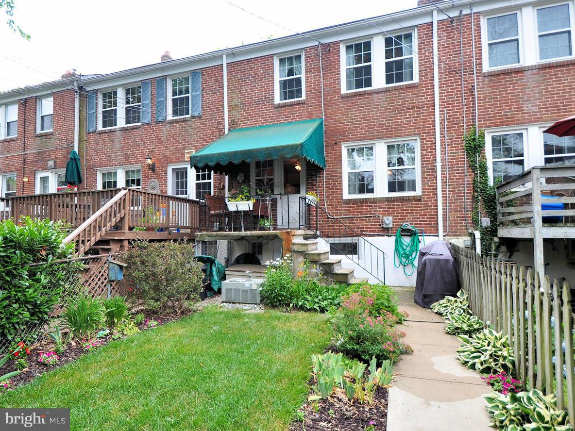 104 Overbrook Road Baltimore, MD 21212 - Photo 22 of 27 a front view of a house with garden