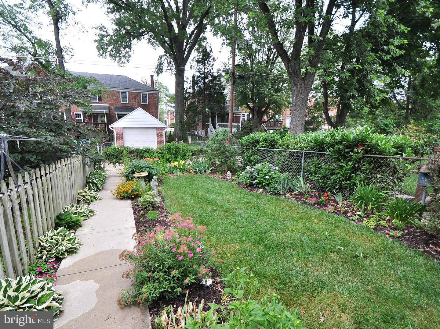 104 Overbrook Road Baltimore, MD 21212 - Photo 23 of 27 a view of a pathway with a wrought fence