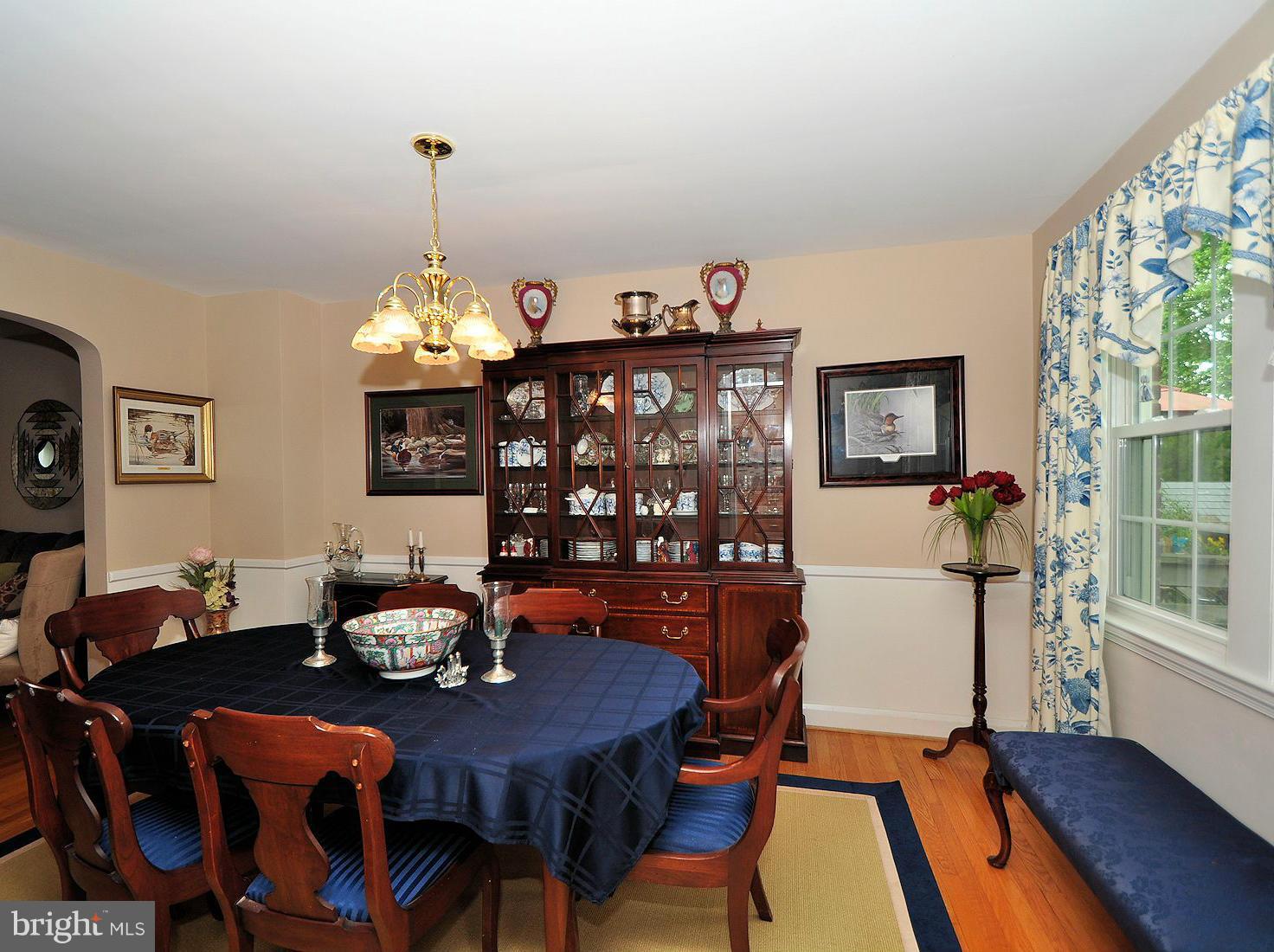 104 Overbrook Road Baltimore, MD 21212 - Photo 10 of 27 a view of a dining room with furniture window and wooden floor