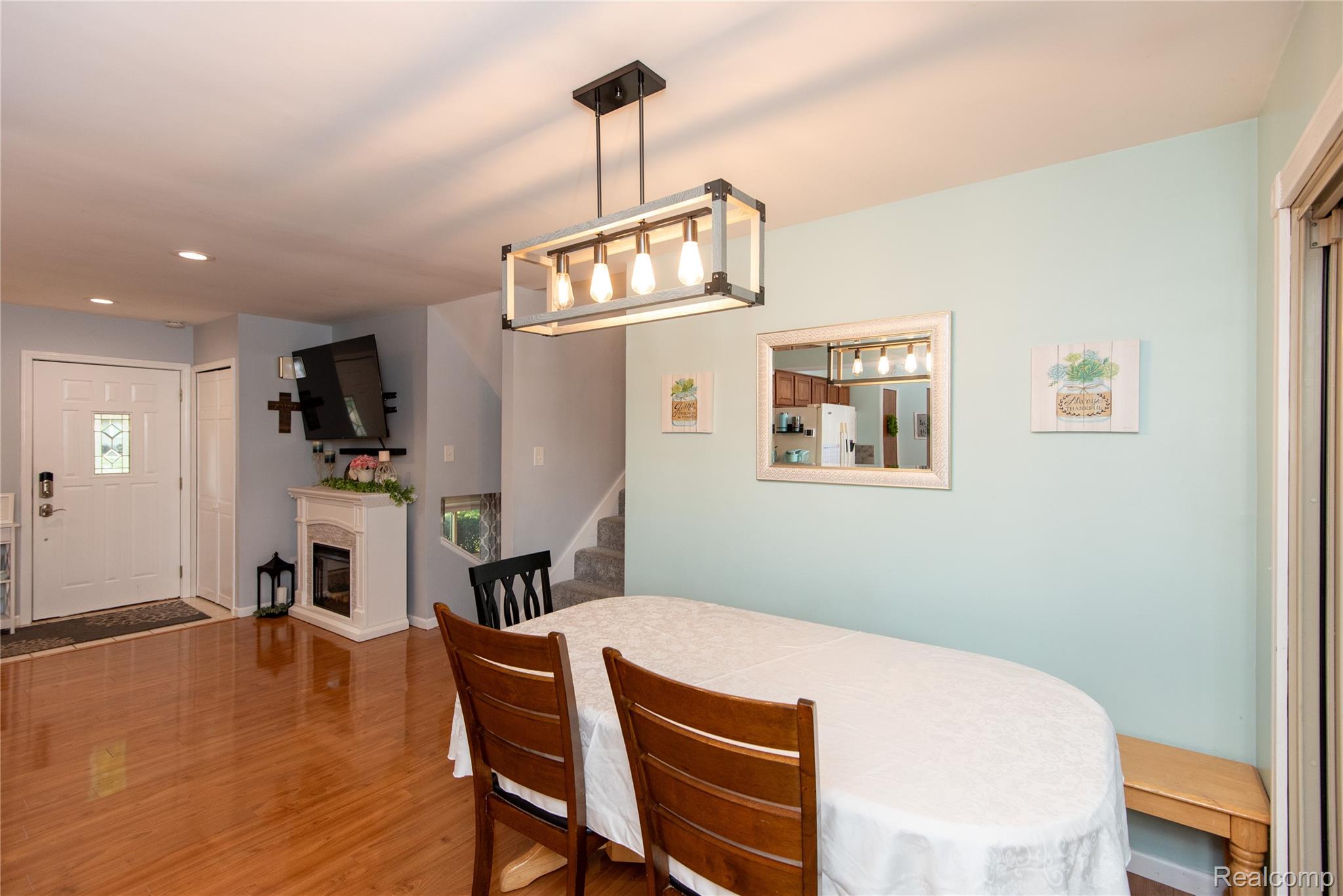 4395 Regency Road Swartz Creek, MI 48473 - Photo 18 of 67 Dining area with a modern linear chandelier