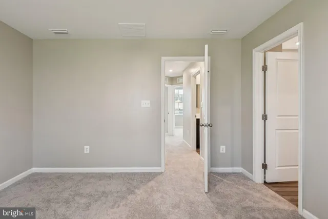 a bathroom with a granite countertop sink toilet tub and shower