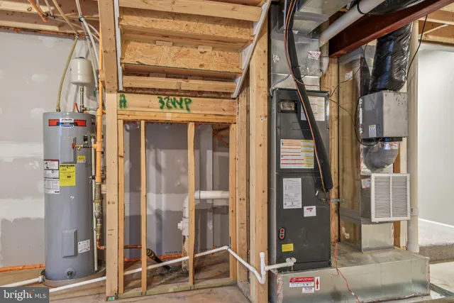 a view of a house with a yard and a large window