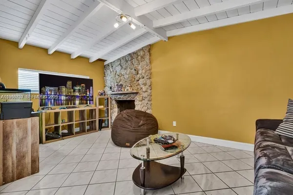a room with furniture and a book shelf