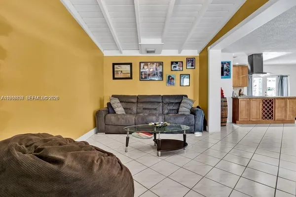 a living room with furniture and a couch