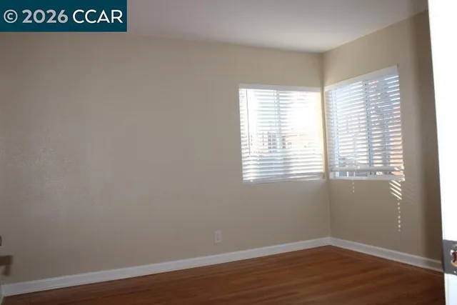 a view of a room that has a window in it