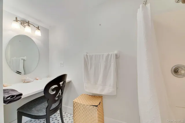 a bathroom with a toilet and a sink
