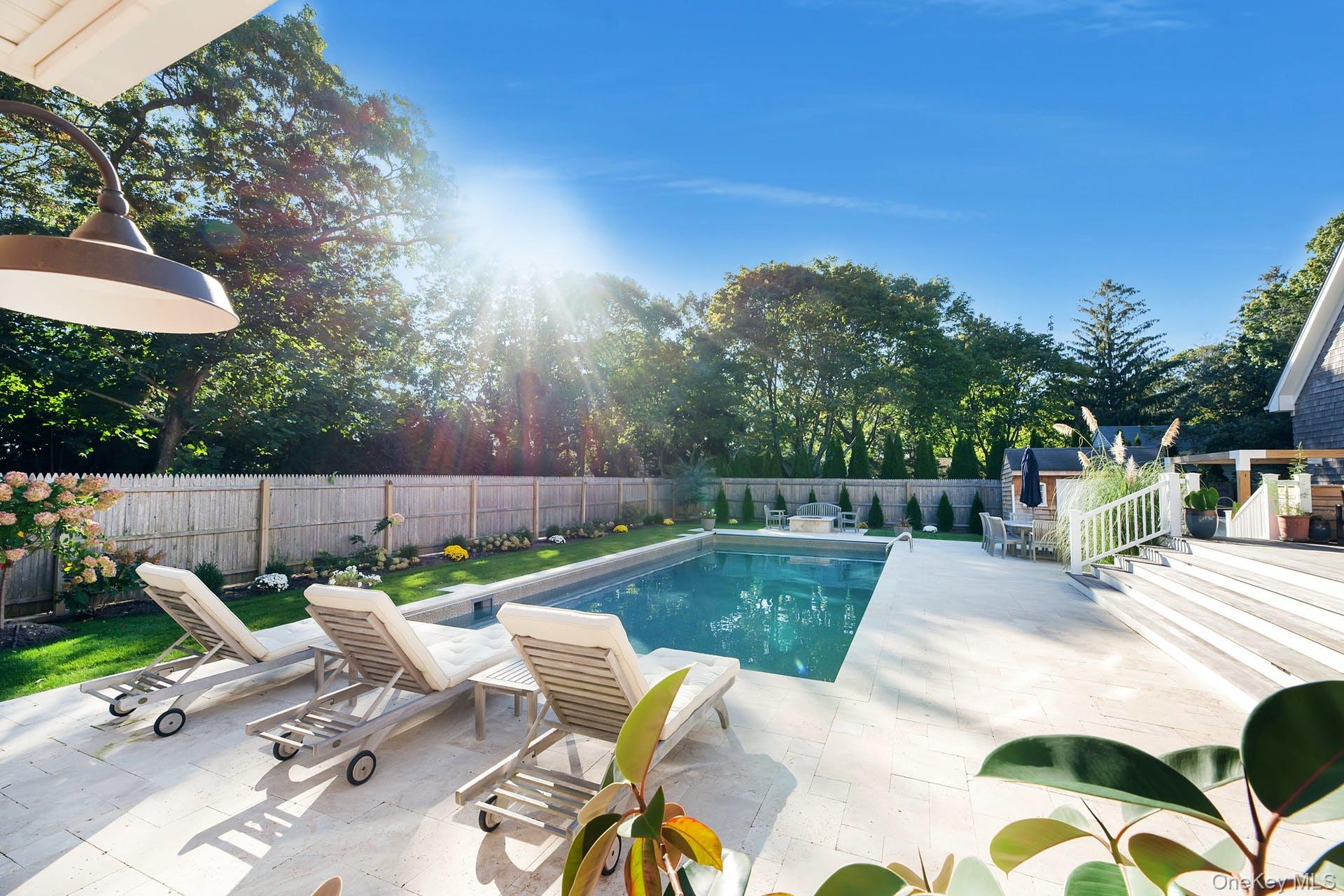 550 Krause Road Mattituck, NY 11952 - Photo 2 of 34 a view of backyard with swimming pool and patio
