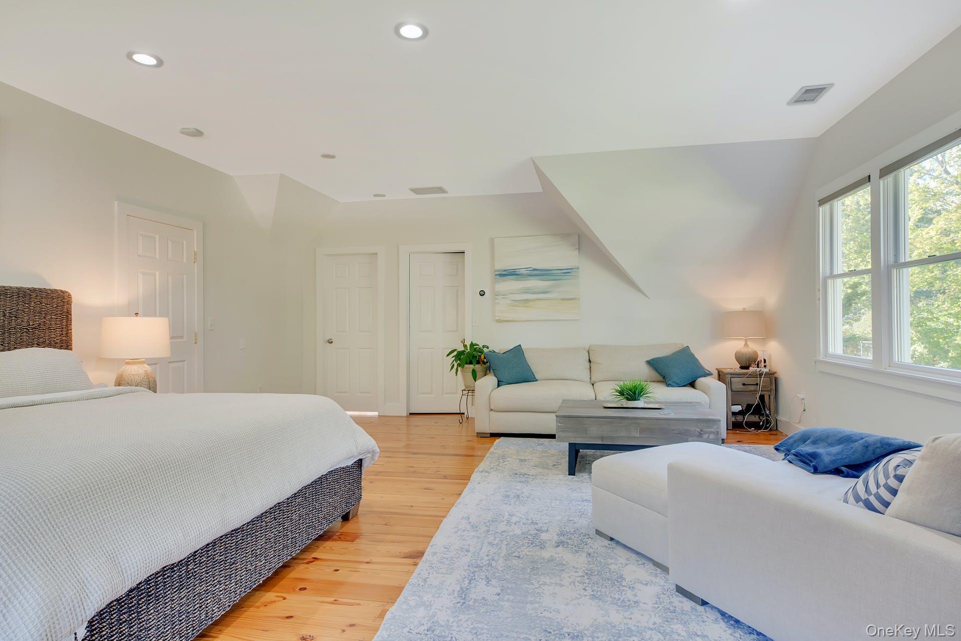 550 Krause Road Mattituck, NY 11952 - Photo 33 of 34 a bedroom with furniture and a large window