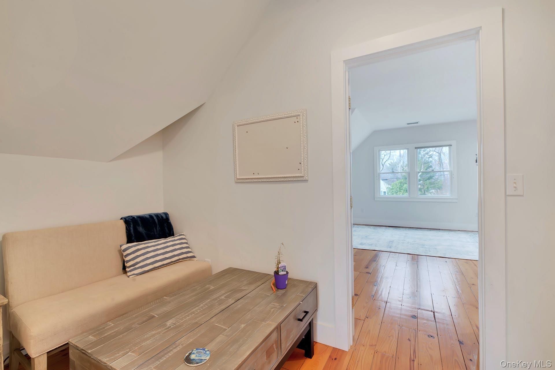 550 Krause Road Mattituck, NY 11952 - Photo 8 of 34 a bedroom with a bed and a window