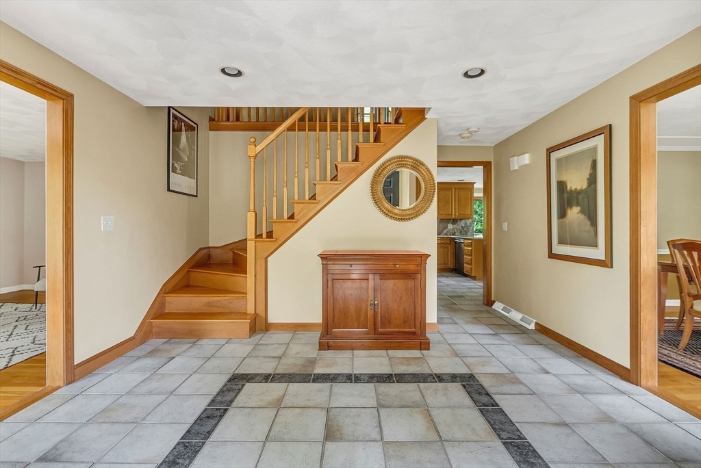 83 Jefferson Road Franklin, MA 02038 - Photo 2 of 34 a view of a hallway with wooden floor and entryway