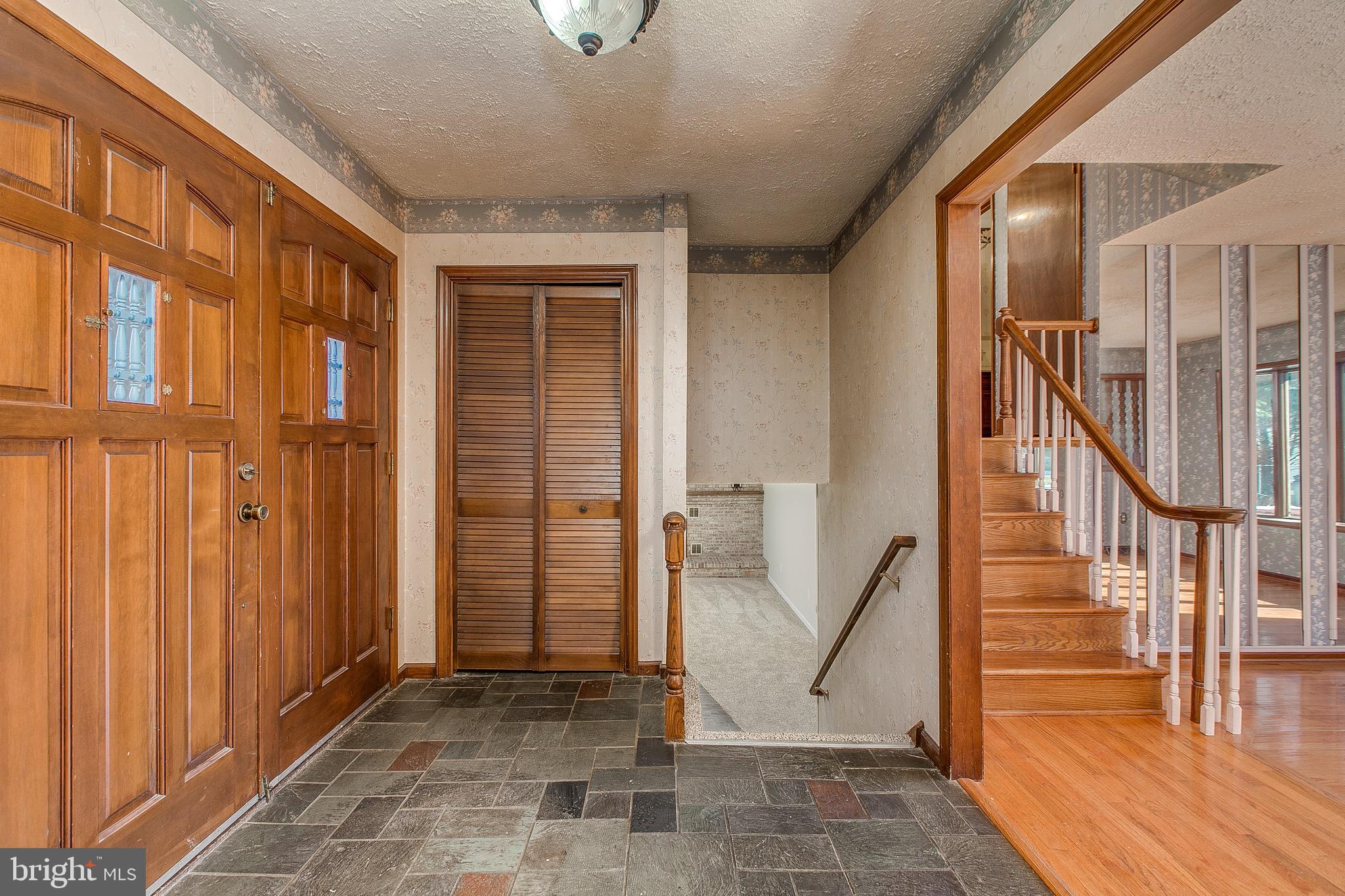 4249 Horine Road Jefferson, MD 21755 - Photo 14 of 33 Foyer with double doors and slate flooring