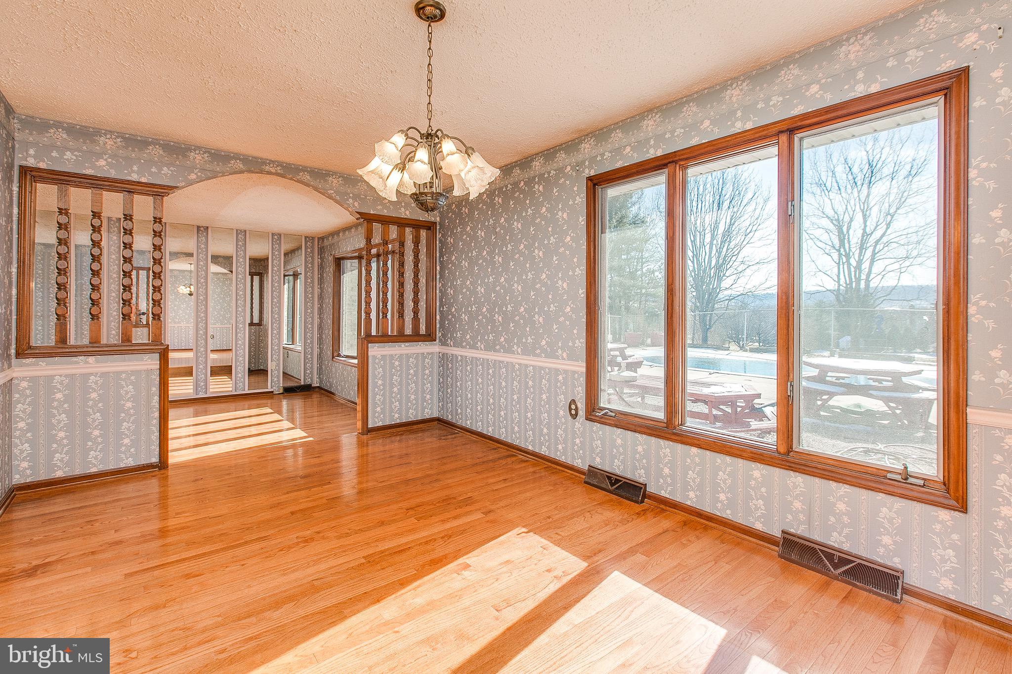 4249 Horine Road Jefferson, MD 21755 - Photo 18 of 33 Formal dining room w/hardwood floors
