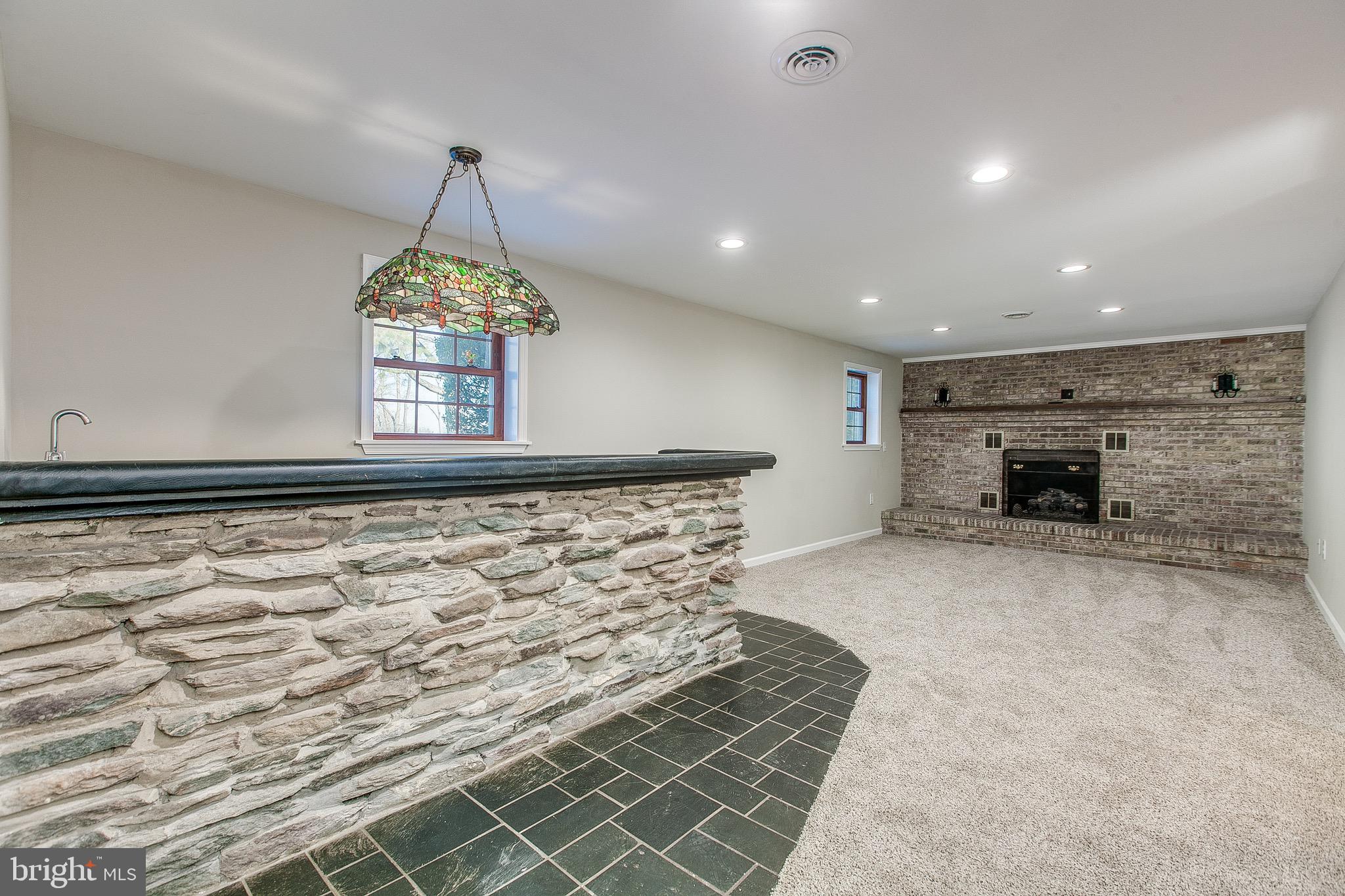 4249 Horine Road Jefferson, MD 21755 - Photo 27 of 33 Newly renovated basement w/fireplace & wet bar