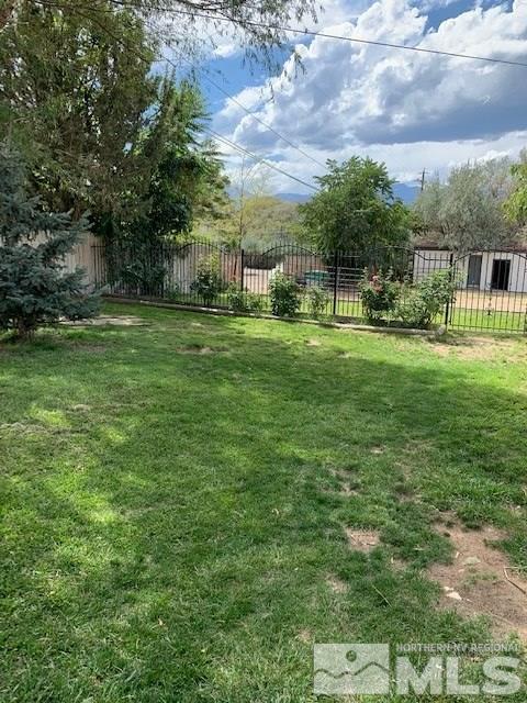 14990 Kivett Lane Reno, NV 89521 - Photo 14 of 16 a view of a house with a big yard