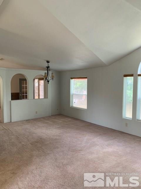 14990 Kivett Lane Reno, NV 89521 - Photo 5 of 16 an empty room with windows