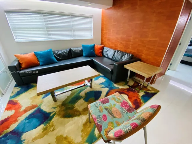 view of living room with furniture and a couch