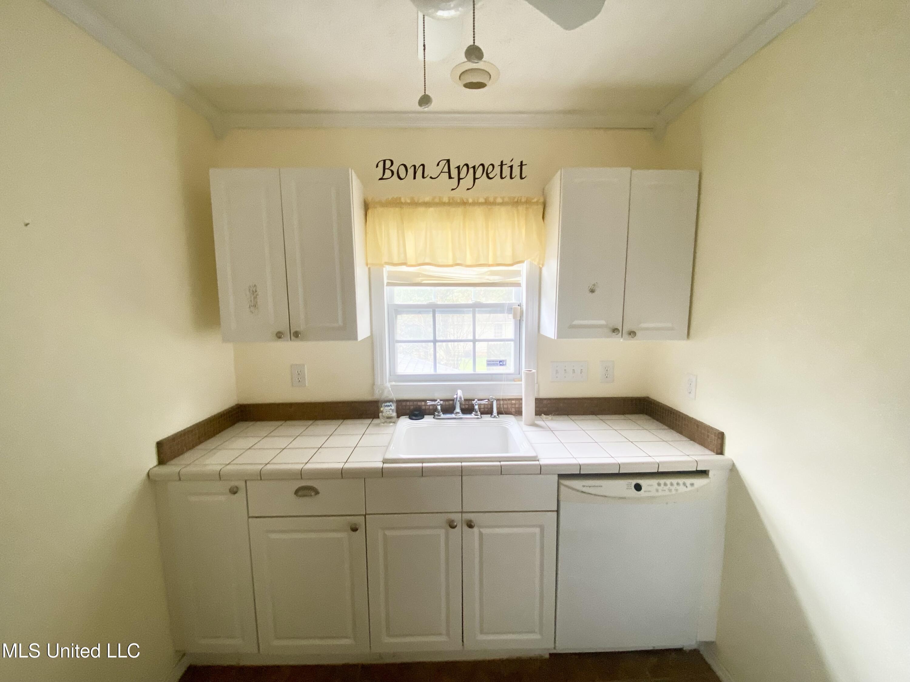 119 Dampeer Street Crystal Springs, MS 39059 - Photo 19 of 23 119 Dampeer Street Kitchen Area 2