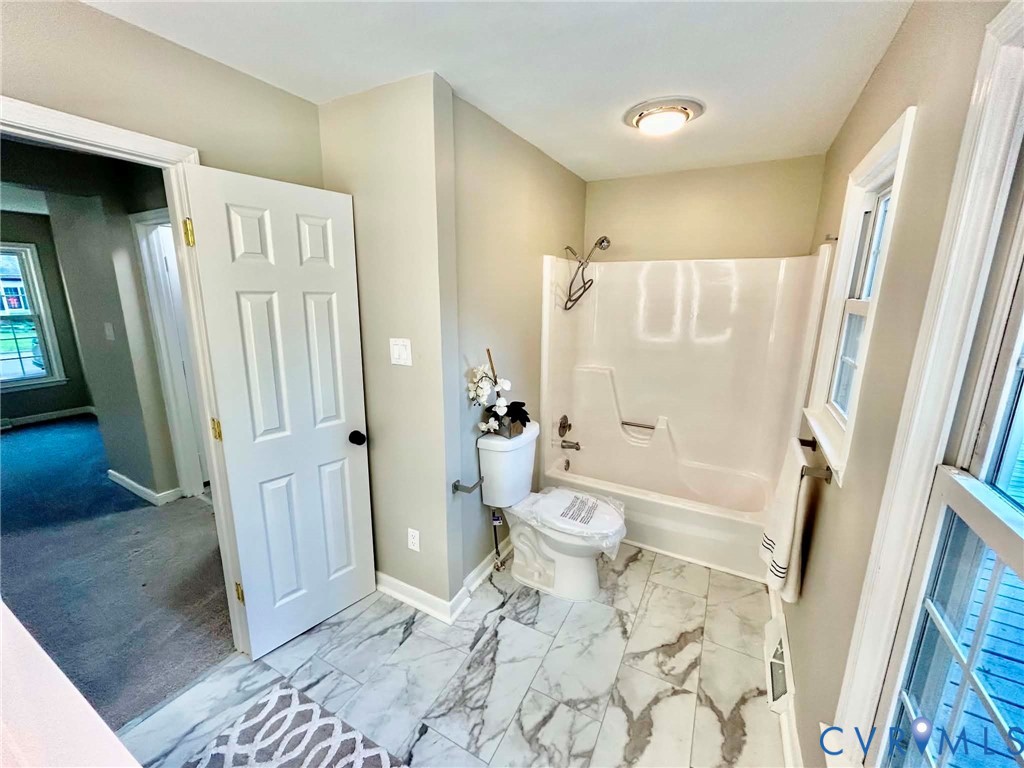 7110 Manning Road Chesterfield, VA 23832 - Photo 32 of 50 Bright, light-filled bathroom featuring marble-loo