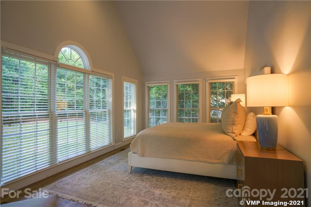 119 Friendfield Drive Fort Mill, SC 29715 - Photo 11 of 24 a bedroom with a bed and a large window