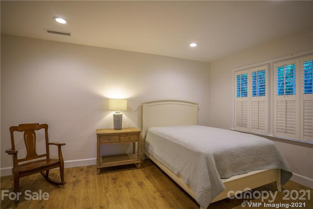 119 Friendfield Drive Fort Mill, SC 29715 - Photo 17 of 24 a bedroom with a bed and a chair