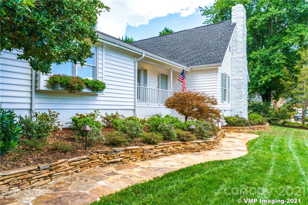 119 Friendfield Drive Fort Mill, SC 29715 - Photo 19 of 24 a front view of a house with garden
