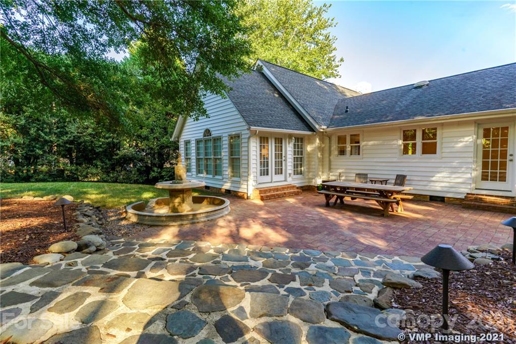 119 Friendfield Drive Fort Mill, SC 29715 - Photo 20 of 24 a view of a house with swimming pool and sitting area