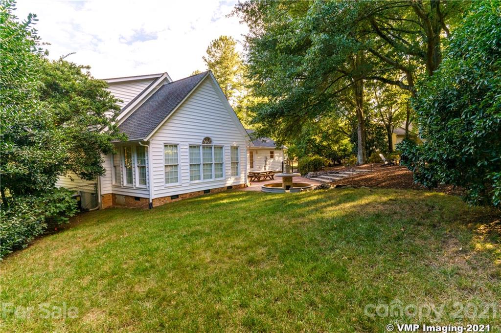119 Friendfield Drive Fort Mill, SC 29715 - Photo 21 of 24 a view of a house with backyard and sitting area