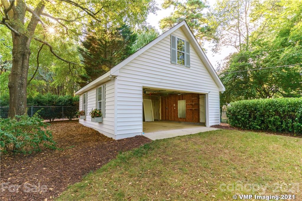 119 Friendfield Drive Fort Mill, SC 29715 - Photo 22 of 24 a front view of a house with a yard and garage