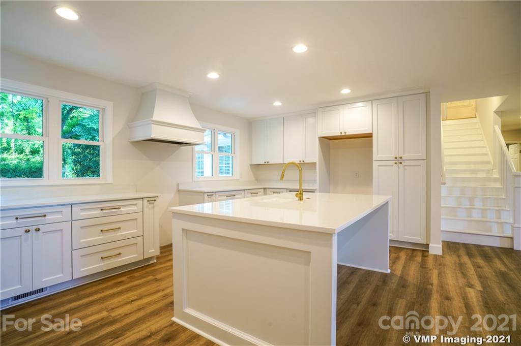119 Friendfield Drive Fort Mill, SC 29715 - Photo 6 of 24 a kitchen with a sink stove and cabinets