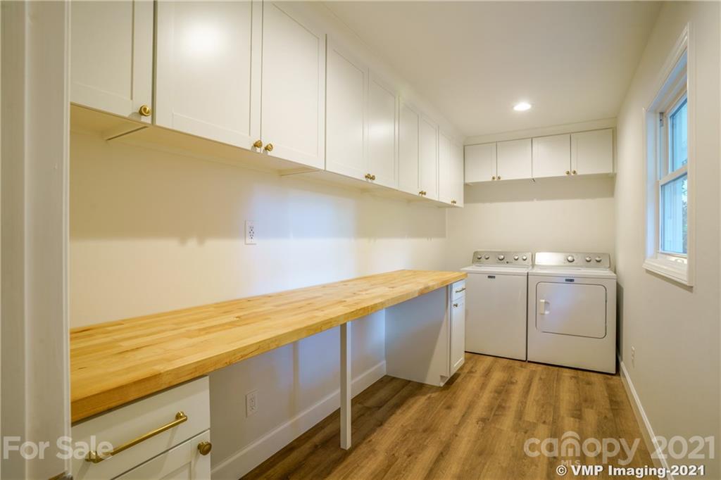 119 Friendfield Drive Fort Mill, SC 29715 - Photo 8 of 24 a view of cabinets and wooden floor