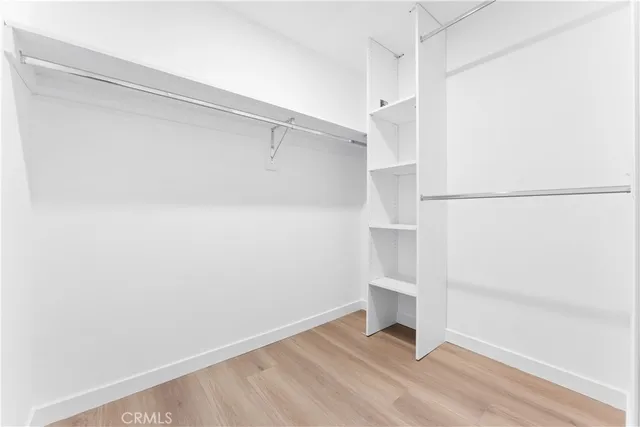 a view of an empty walk in closet