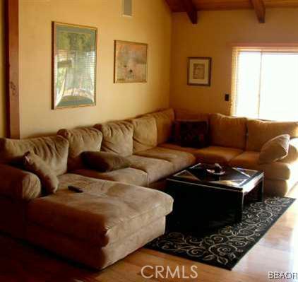 26436 Apache Lake Rimforest, CA 92378 - Photo 7 of 7 a living room with furniture and a rug
