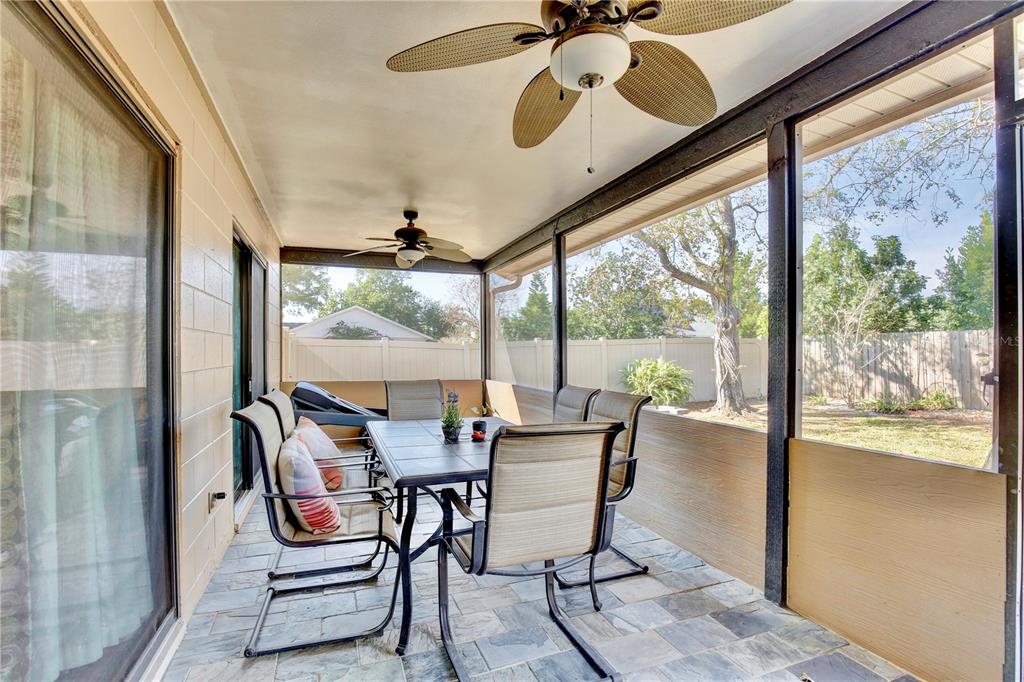300 Springview Drive Sanford, FL 32773 - Photo 25 of 55 a dining room with furniture water view and a floor to ceiling window