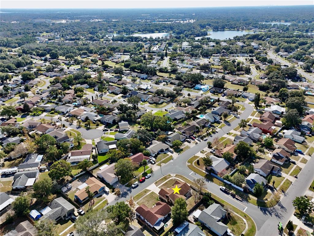300 Springview Drive Sanford, FL 32773 - Photo 43 of 55 an aerial view of a city with lots of residential buildings