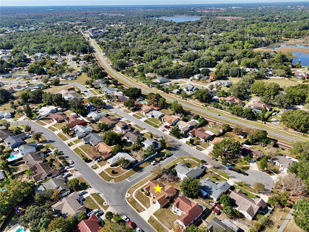 300 Springview Drive Sanford, FL 32773 - Photo 45 of 55 an aerial view of a city with lots of residential buildings